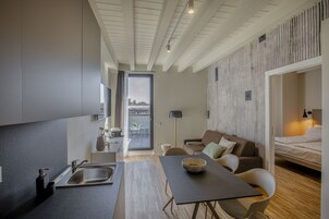 Premium Apartment | Living area | 32-inch flat-screen TV with digital channels, TV