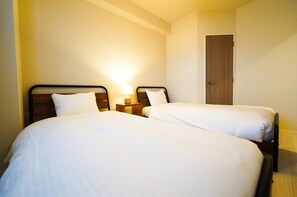 2 多间卧室、办公桌、免费 WiFi、床单