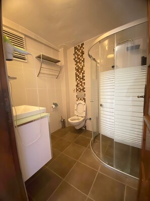 Regadera y secadora de cabello