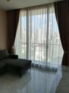 Family Apartment | Living area | 42-inch Smart TV with cable channels, TV