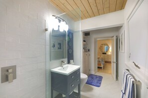Shower, hair dryer, towels, shampoo