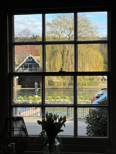 A Beautiful River Frontage Townhouse with  walled garden, hot tub and fire pit.