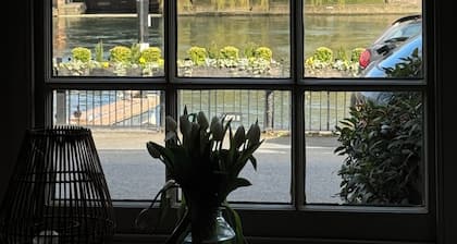 A Beautiful River Frontage Townhouse with walled garden, hot tub and fire pit.