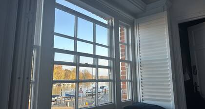 A Beautiful River Frontage Townhouse with walled garden, hot tub and fire pit.