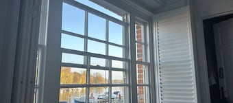 A Beautiful River Frontage Townhouse with walled garden, hot tub and fire pit.