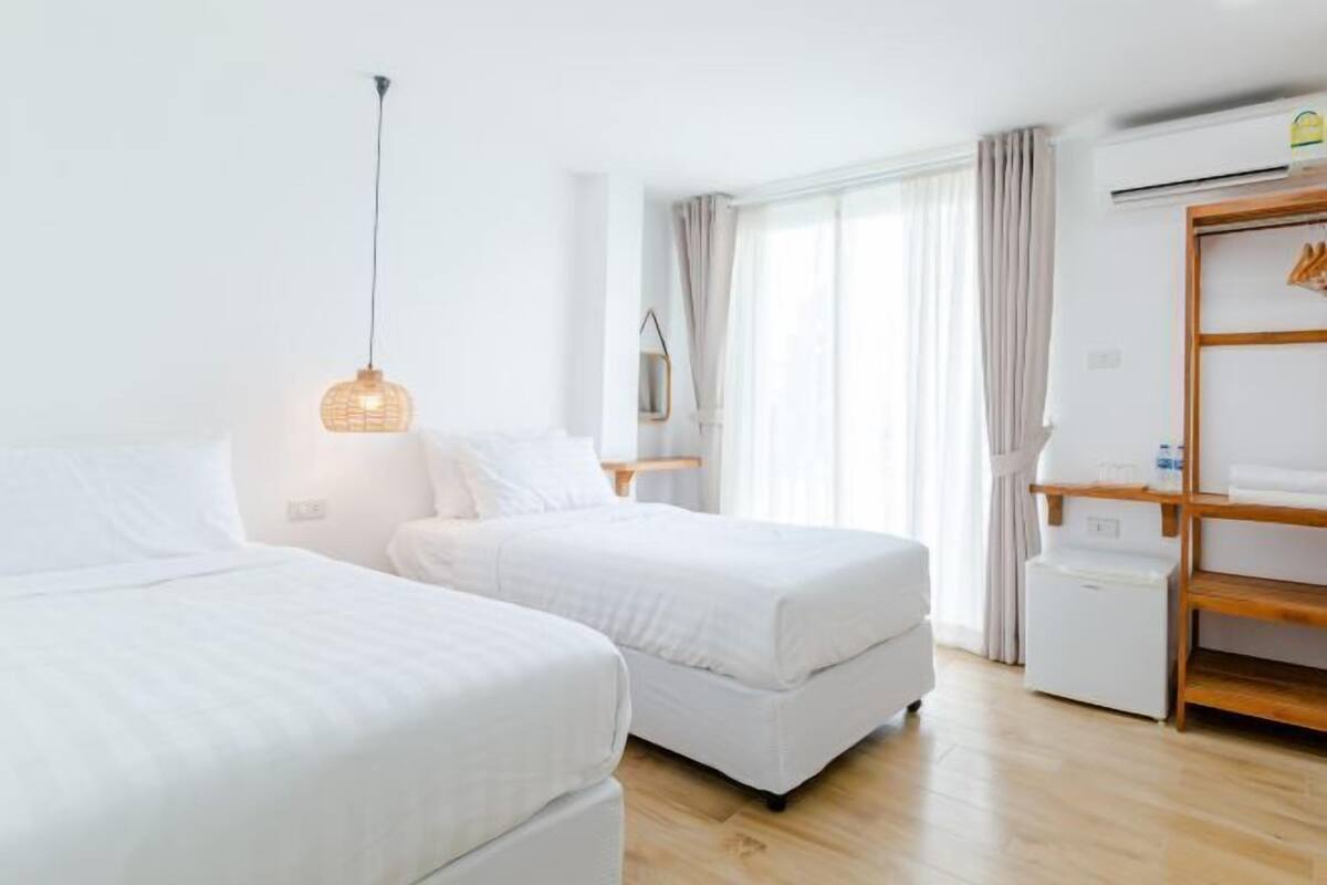 Premium bedding, down comforters, desk, blackout drapes