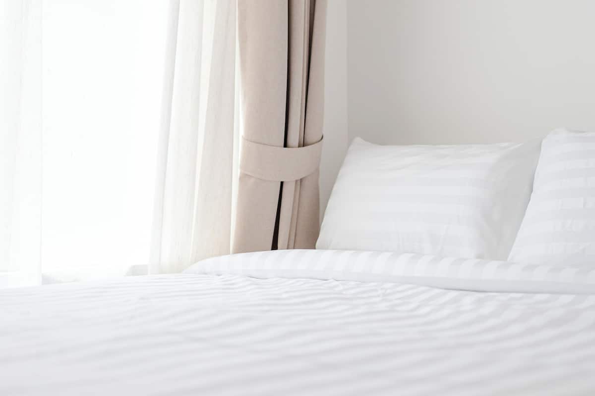 Premium bedding, down comforters, individually decorated