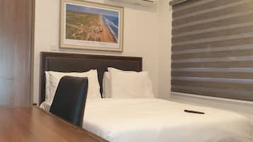 Studio Basic | 1 kamar tidur, Wi-Fi gratis, dan seprai linen