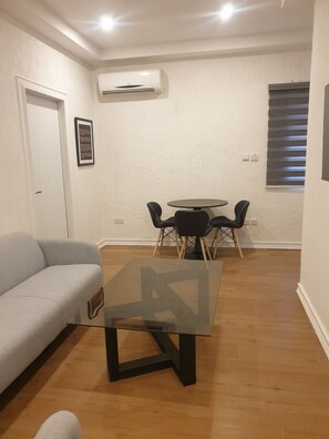 Kahden hengen exclusive-huone (kaksi sänkyä) | Oleskelualue