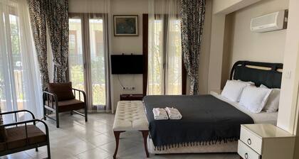 Grand Teoshan Otel ve Tatil Evleri