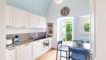 Villa | Private kitchen | Fridge, oven, stovetop, dishwasher