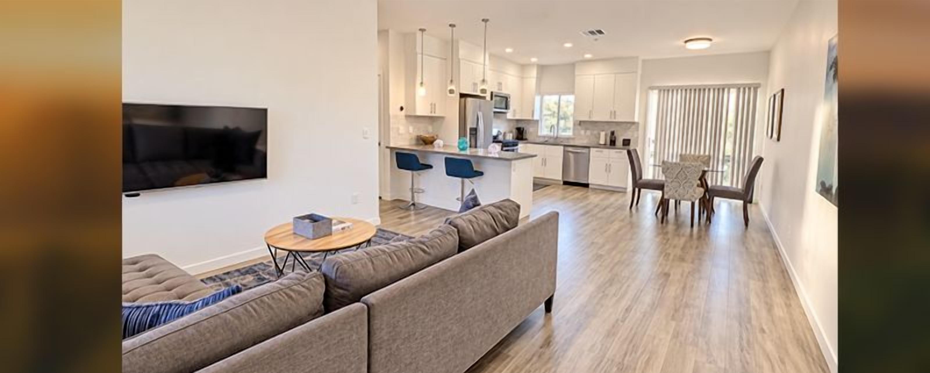 Bright, open Sonoma living space with comfortable seating and a fully equipped kitchen.