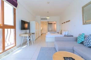 Apartment (0 Bedroom) | Living area | 50-cm plasma TV with satellite channels, TV
