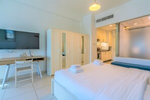 Apartment (0 Bedroom) | Desk, iron/ironing board, bed sheets
