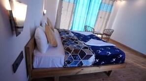 Habitació Deluxe | 1 dormitori, llençols de cotó egipci i roba de llit d'alta qualitat 