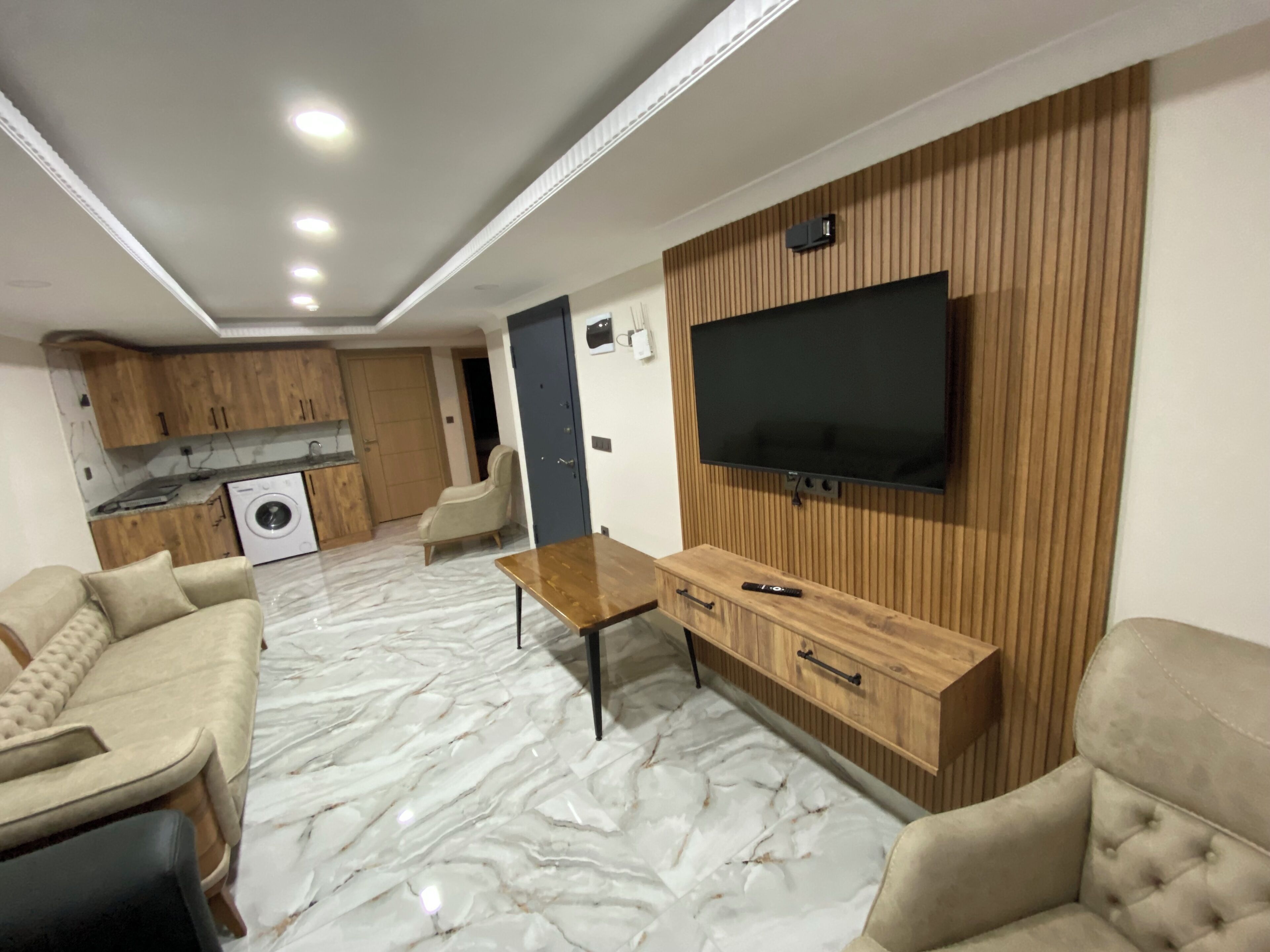 Panoramic Apartment | Living area | 40-inch LED TV with satellite channels