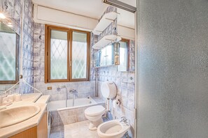 Shower, bidet, towels, soap