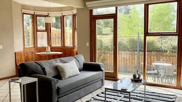 Family Apartment, 1 Bedroom, Courtyard Area | Living area | Smart TV, heated floors