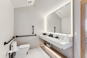 Shower, hair dryer, towels, shampoo
