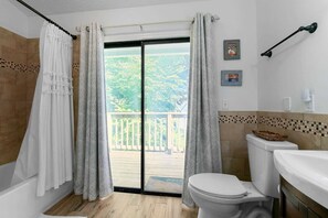 Bathtub, hair dryer, towels