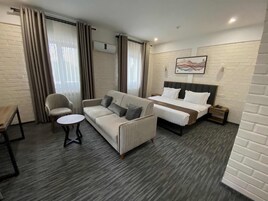 Deluxe Double Room | In-room safe, blackout drapes, iron/ironing board, free WiFi
