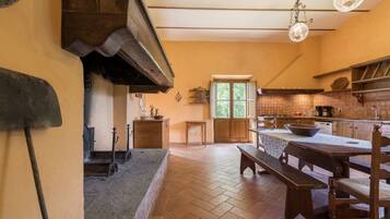 Villa | Private kitchen | Full-sized fridge, stovetop, dishwasher, coffee/tea maker