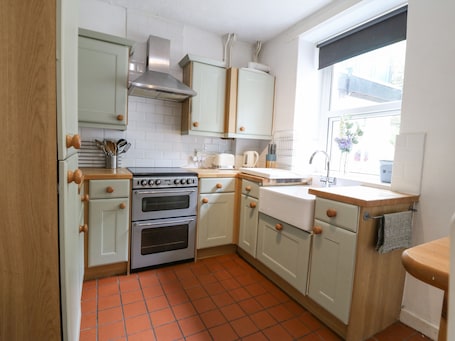 Fridge, electric kettle, toaster, cookware/dishes/utensils