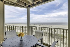 Outdoor dining - The View | 180° Oceanfront Views from Screened Porch | Port O Call (Isle of Palms)