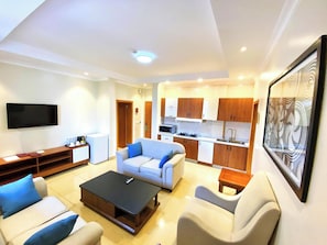 Suite | Living room | 52-inch Smart TV with cable channels, Netflix, streaming services