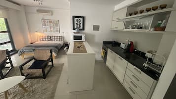 Deluxe Condo, 1 Double Bed, Non Smoking, City View | Private kitchen | Fridge, microwave, oven, stovetop