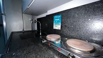 Apartamento design | Cozinha privada | Frigobar, micro-ondas
