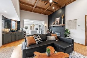 TV, fireplace, books, offices