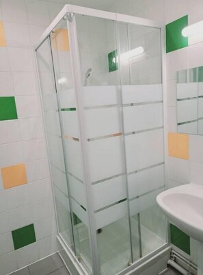 Shower, hair dryer, soap, shampoo