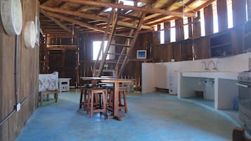 Cabane Panoramique, vue océan | Restauration dans la chambre