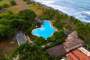 Outdoor pool - Steps from beach with private pool, rooftop terrace & swim up bar beach club! (Playa Hermosa)