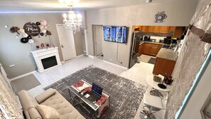 Smart TV, fireplace, DVD player, books