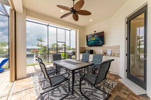 Dining - Stunning Waterfront-canal home minutes from Charlotte Harbor, Saltwater Pool! (Punta Gorda)