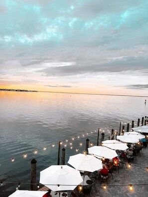 Outdoor dining - Stunning Waterfront-canal home minutes from Charlotte Harbor, Saltwater Pool! (Punta Gorda)