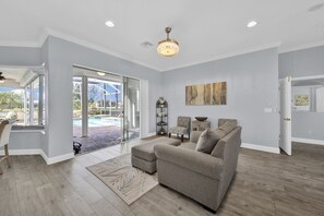 Living area - Beautiful home, golf community, pool, lanai, 15 min  from RSW,  5 min to outlets (Estero)