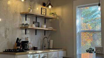 Microwave, coffee/tea maker, cookware/dishes/utensils