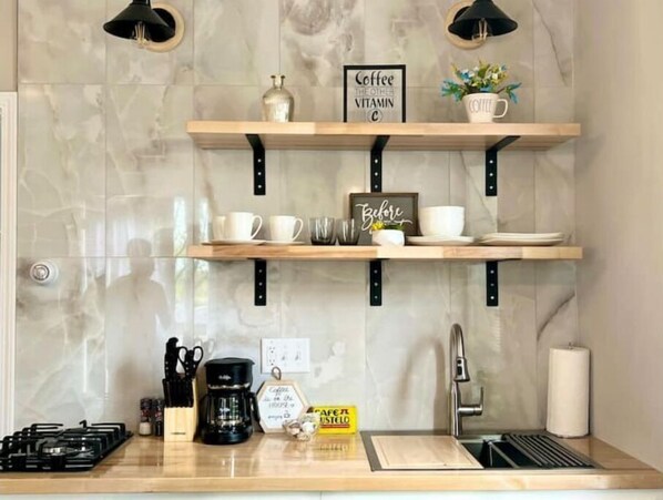 Microwave, coffee/tea maker, cookware/dishes/utensils