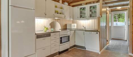 Fridge, stovetop, dishwasher, coffee/tea maker