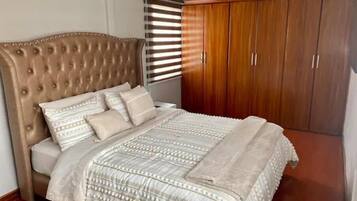 3 bedrooms, desk, iron/ironing board, travel crib