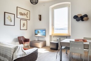 Living area - GuestHost - Comfortable apartment with a seaview ideal for 4 guests is located in the ancient village of Marola, where you can discover the real Liguria, where you can immerse yourself in the life of a small Ligurian village, a few kilometers from Portov (La Spezia)