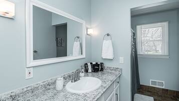 Hair dryer, towels, soap, shampoo