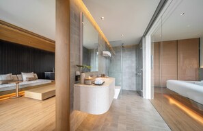 Family Suite | Bathroom | Shower, hair dryer, bathrobes, slippers