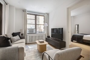 TV, stereo - Charming Midtown East 2BR w/ Gym & W/D, nr Grand Central, by Blueground (Midtown)