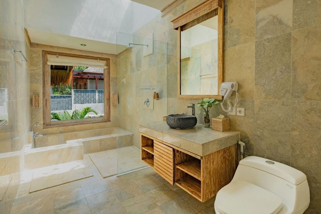 Suite, Multiple Beds, Garden View | Bathroom | Free toiletries, hair dryer, slippers, towels