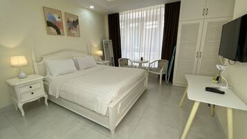 Kondominium Klasik, 1 Tempat Tidur Queen, pemandangan halaman | 1 kamar tidur, setrika/meja setrika, dan Wi-Fi gratis
