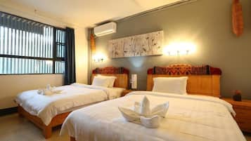 Family Room | Premium bedding, desk, free WiFi